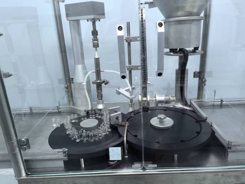 YHGZ-20西林瓶灌裝加塞機(jī)實(shí)拍圖 YHGZ-20西林瓶灌裝加塞機(jī)實(shí)拍圖